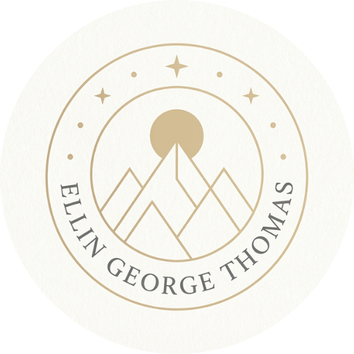 A circular logo features minimalist mountains with a sun above, surrounded by stars. The text "ELLIN GEORGE THOMAS" curves along the bottom.
